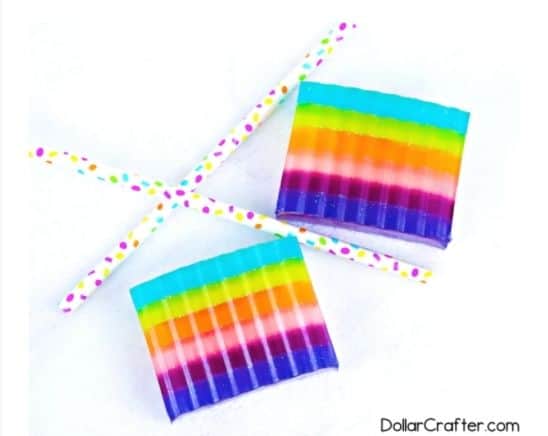 two bars of rainbow colored soap