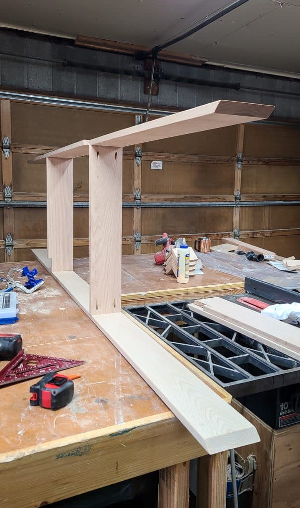 The sofa table is fully assembled for their Behind-the-Couch Table with Outlet project.