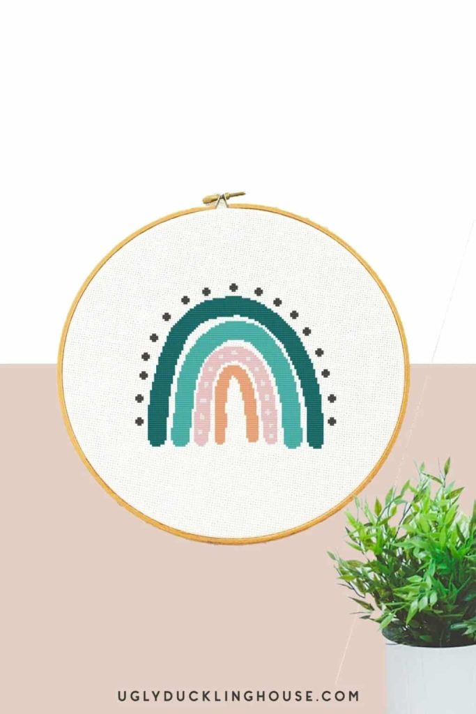 Cross stitch of a boho rainbow
