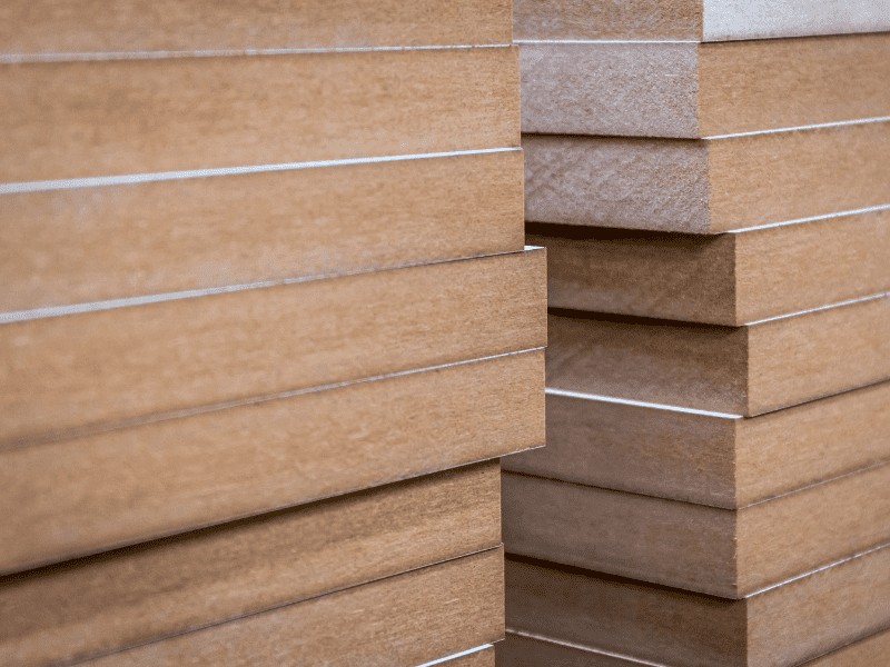 Stacks of MDF that can be used in building as a cheap way to build projects.