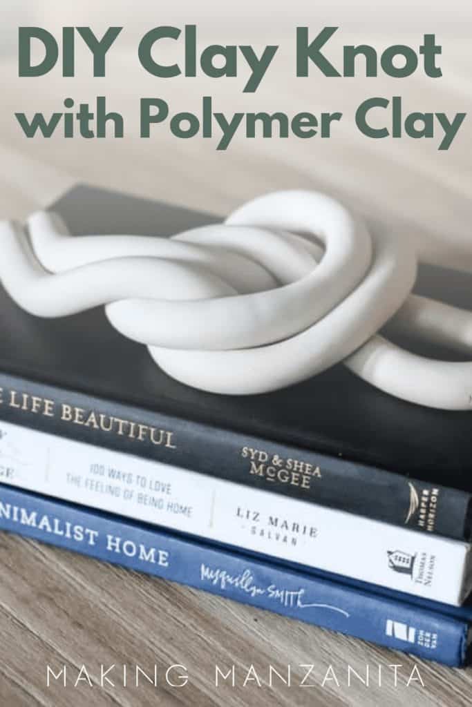 Polymer clay knot placed on top of stacked books with text overlay that says DIY Clay Knot with Polymer Clay