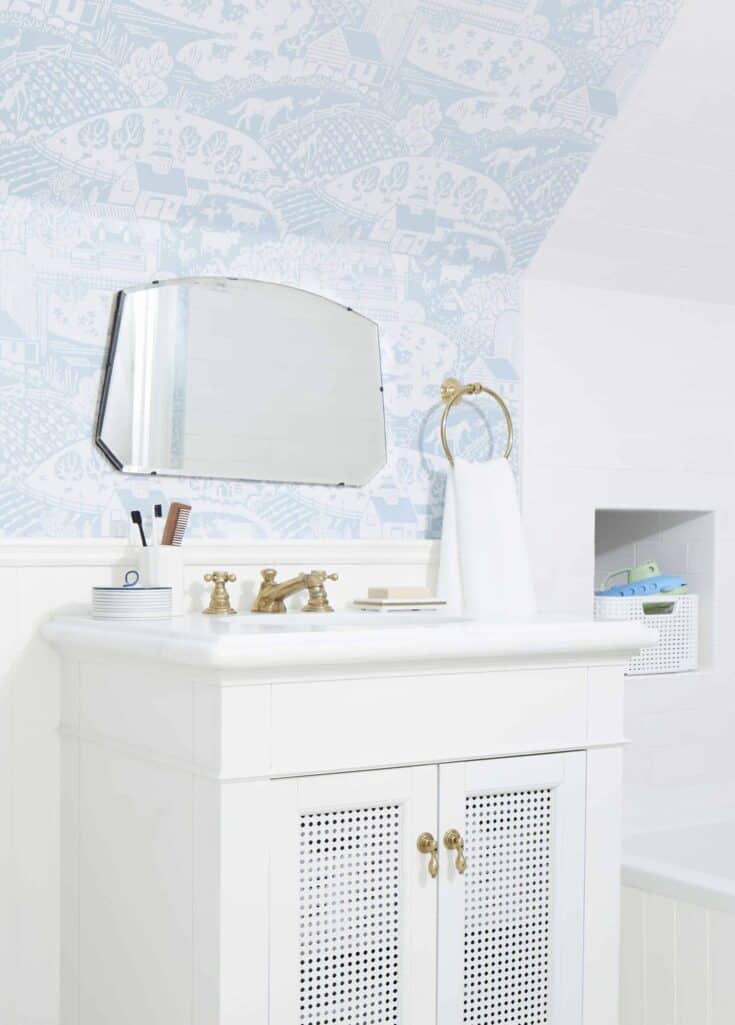 https://www.makingmanzanita.com/wp-content/uploads/2022/03/Farrow-And-Ball-Wallpaper-Kids-Bathroom-Cute-White-Vanity-scaled-1-735x1025.jpg