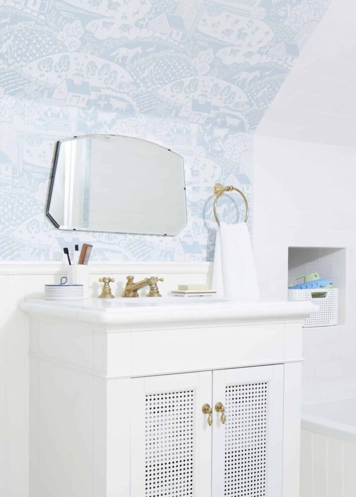 https://www.makingmanzanita.com/wp-content/uploads/2022/03/Farrow-And-Ball-Wallpaper-Kids-Bathroom-Cute-White-Vanity-scaled-1-735x1025.jpg