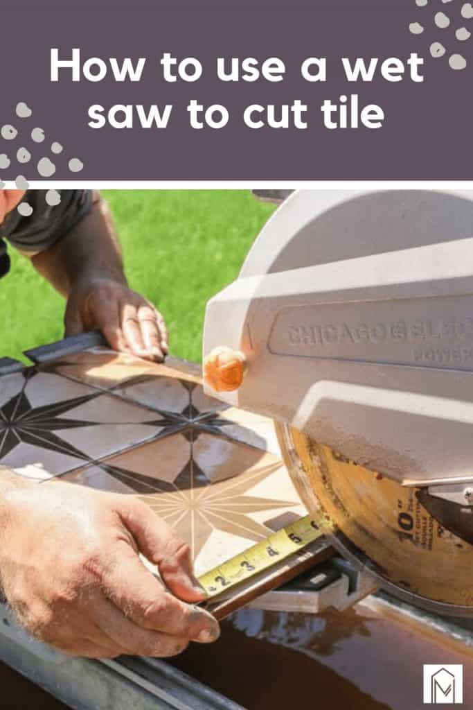 Man cutting a tile using wet saw in the backyard with text overlay that says how to use a wet saw to cut tile