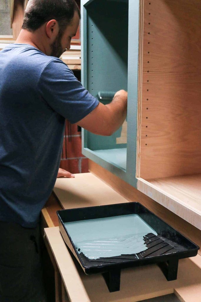 Our hallway cabinet is almost complete! In this step, we're painting the cabinet a nice green color.
