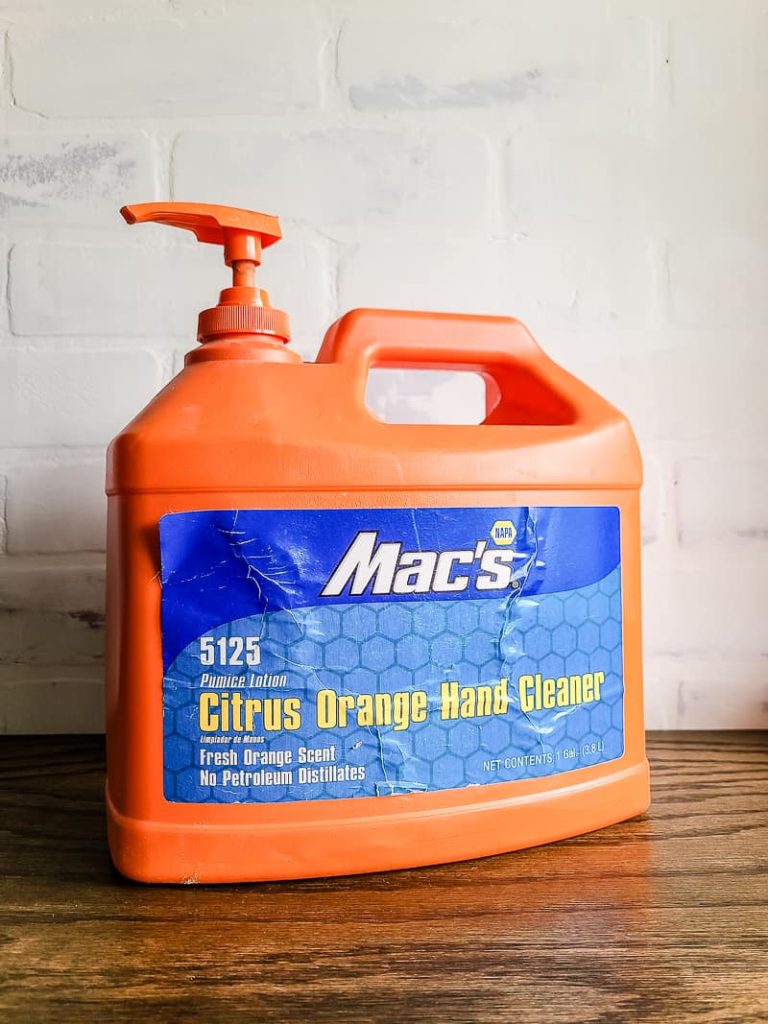 pump jug of Mac's citrus orange hand cleaner for how to get wood stain off hands