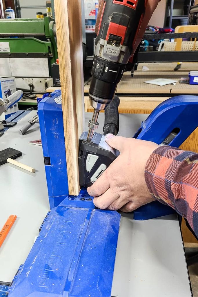 Using the Kreg 720Pro to drill pocket holes in board for DIY deck box.