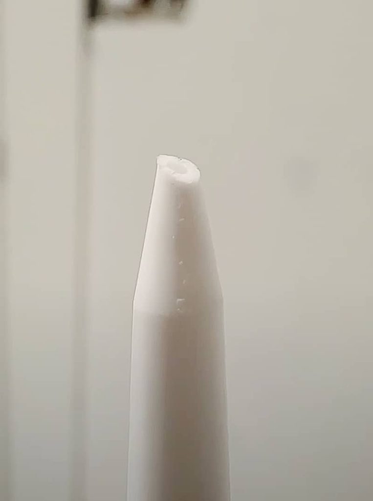 The end of the tube of caulking should be cut at a 45 degree angle. The further down you cut on the neck of the tube, the more caulk will come out. 