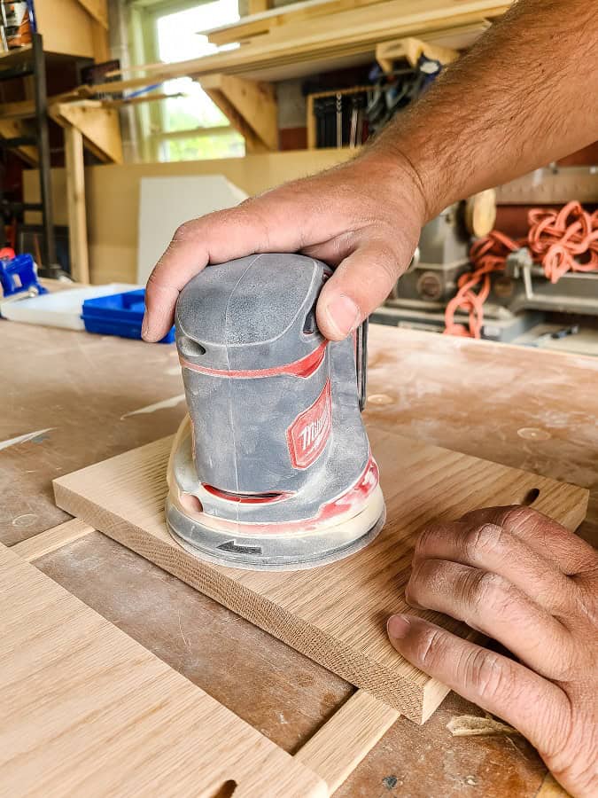 Sand all wood smooth with orbital sander for your wood towel rack