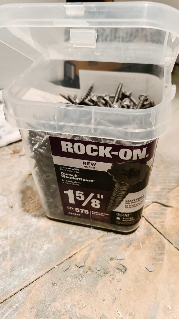 Plastic container of Rock-On 1 5/8" screws