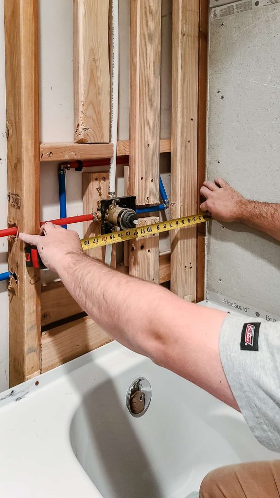 Measuring around plumbing for cement board installation