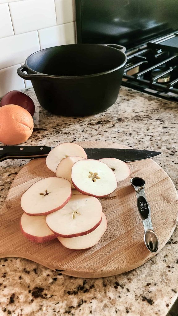 To create this heavenly simmer pot for fall, simply mix together all of the ingredients in a large pot (like a saucepan, dutch oven, or stockpot). Then cover the ingredients with water and place it on the stovetop. 