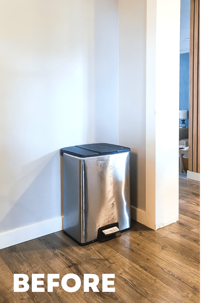 the before picture of a DIY trash can cabinet