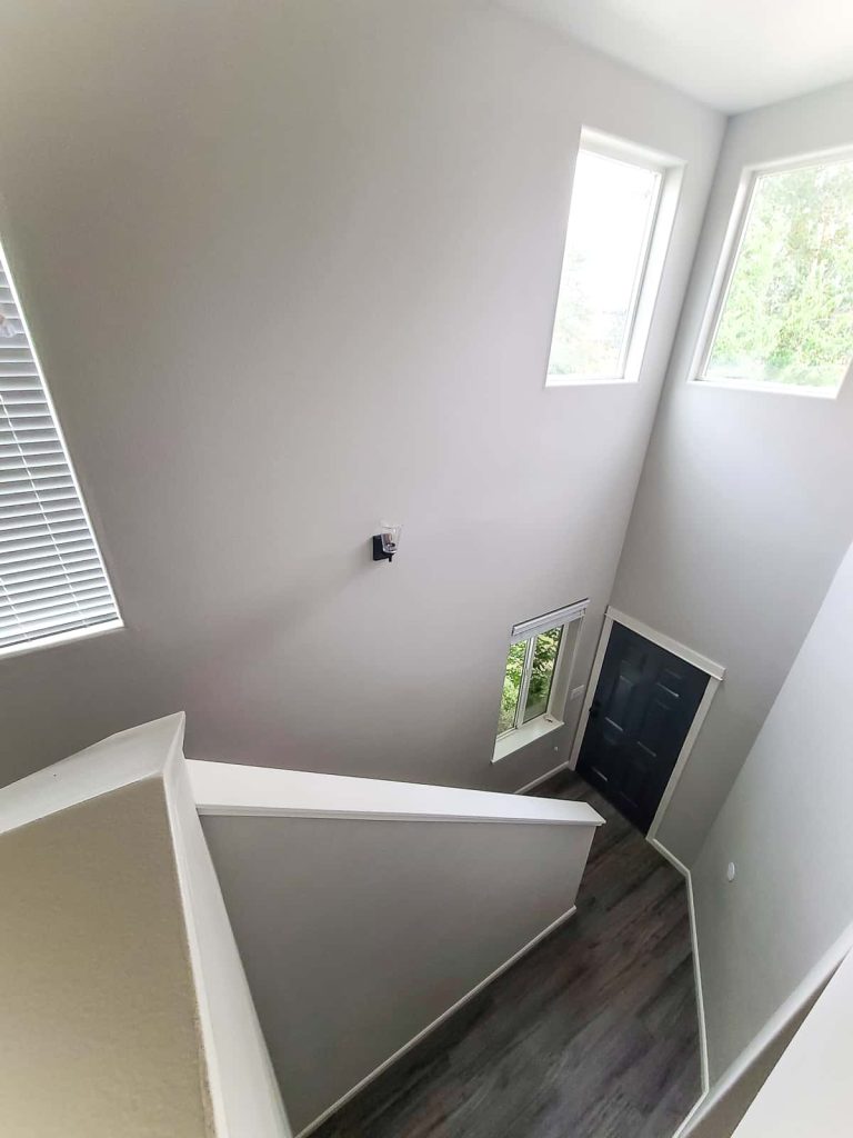 An interior shot of the house, taken on the second floor with a warm neutral paint color, behr mineral