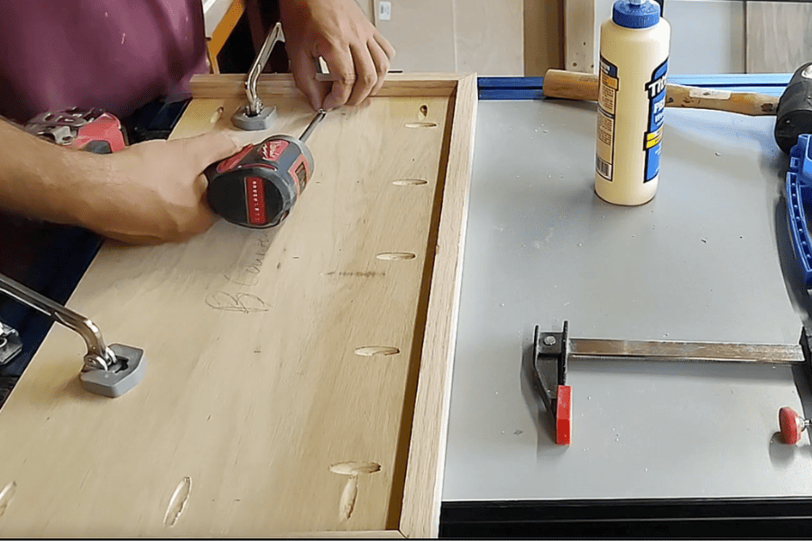 Making top for DIY trash can with pocket hole joinery adding trim around the end of plywood