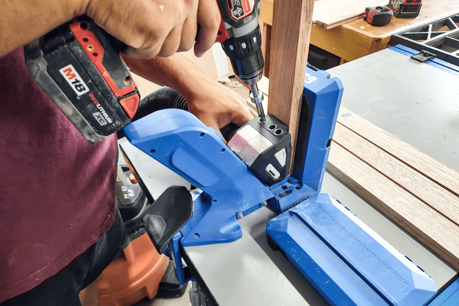 Use a pocket hole jig to drill pocket holes.