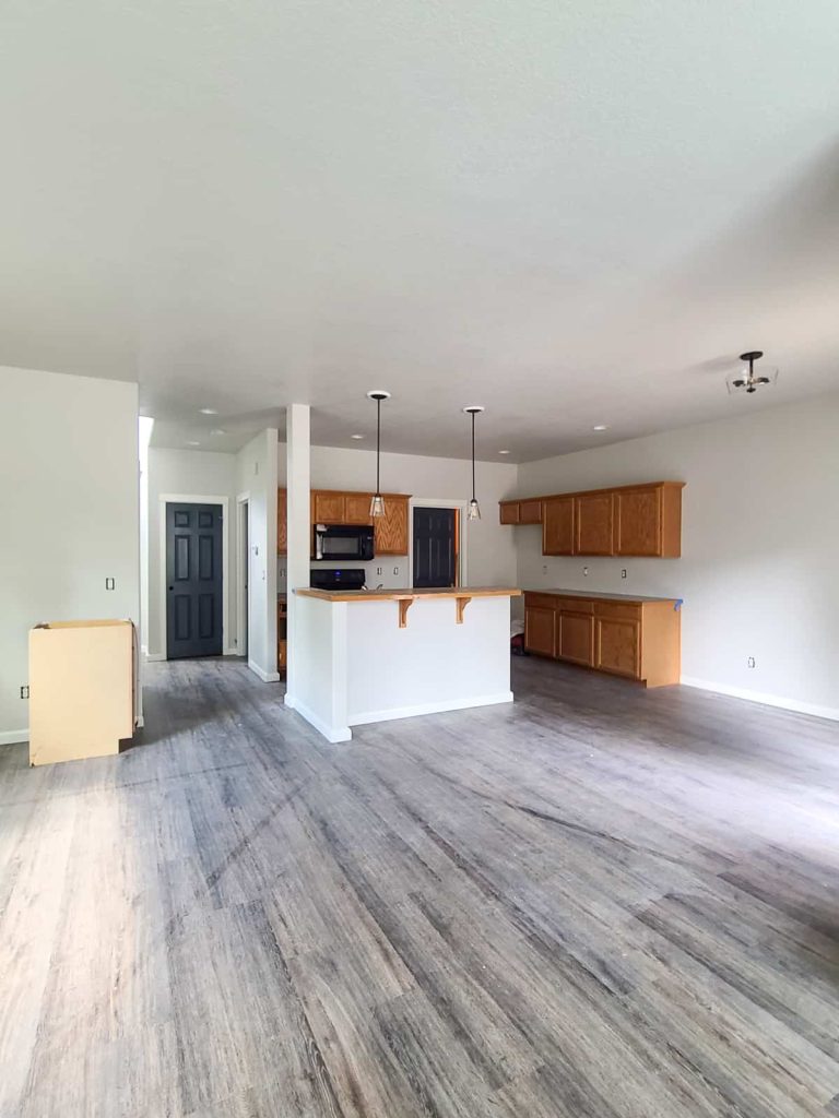 I love this kitchen area with an open floor plan painted in behr mineral