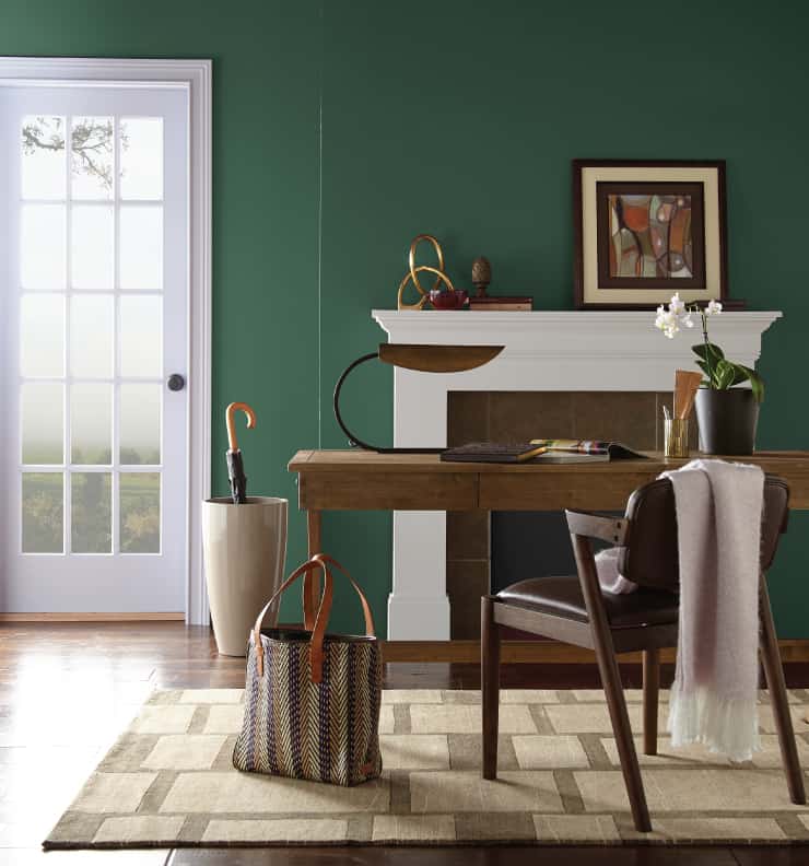 If you're looking to all major color to your walls, try something like Behr's Vine Leaf - which is a beautiful bold green paint color 