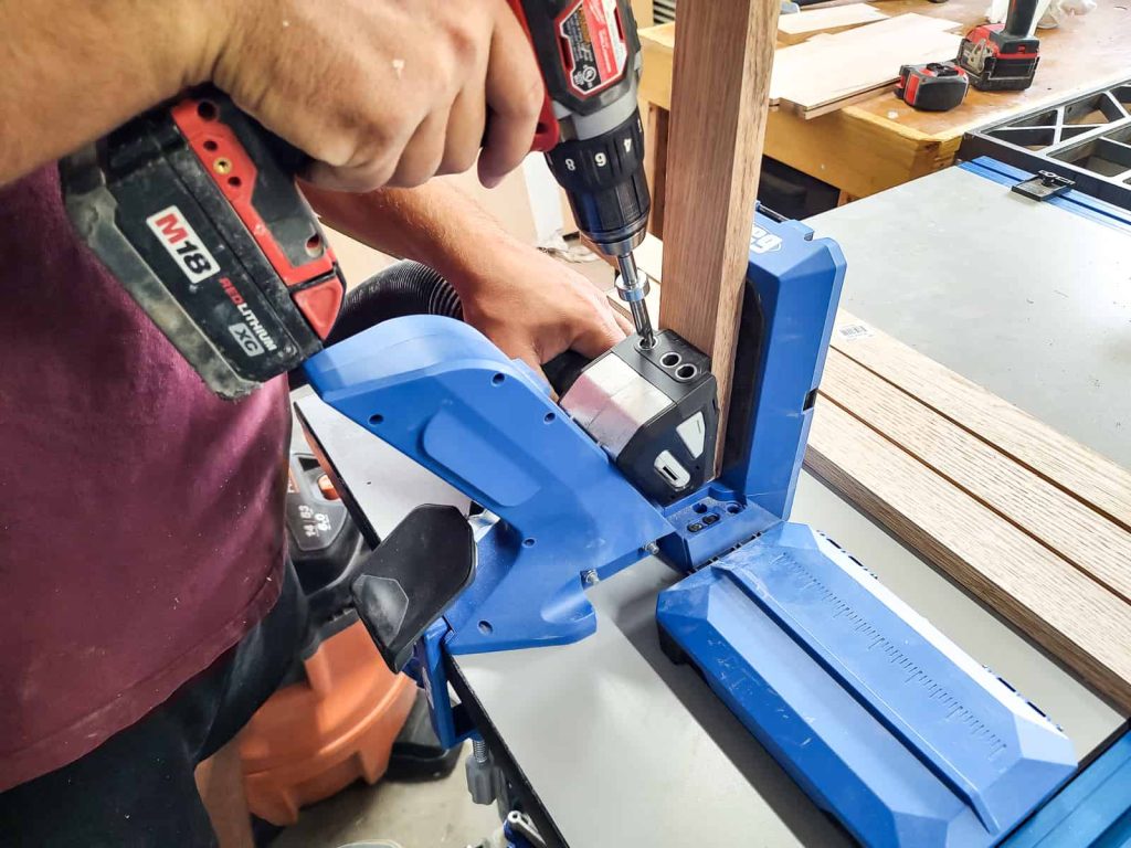 Drill pocket holes to DIY trash can cabinet