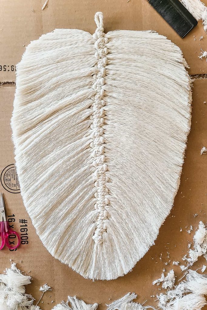 Both side of cord cut into the shape of a feather.