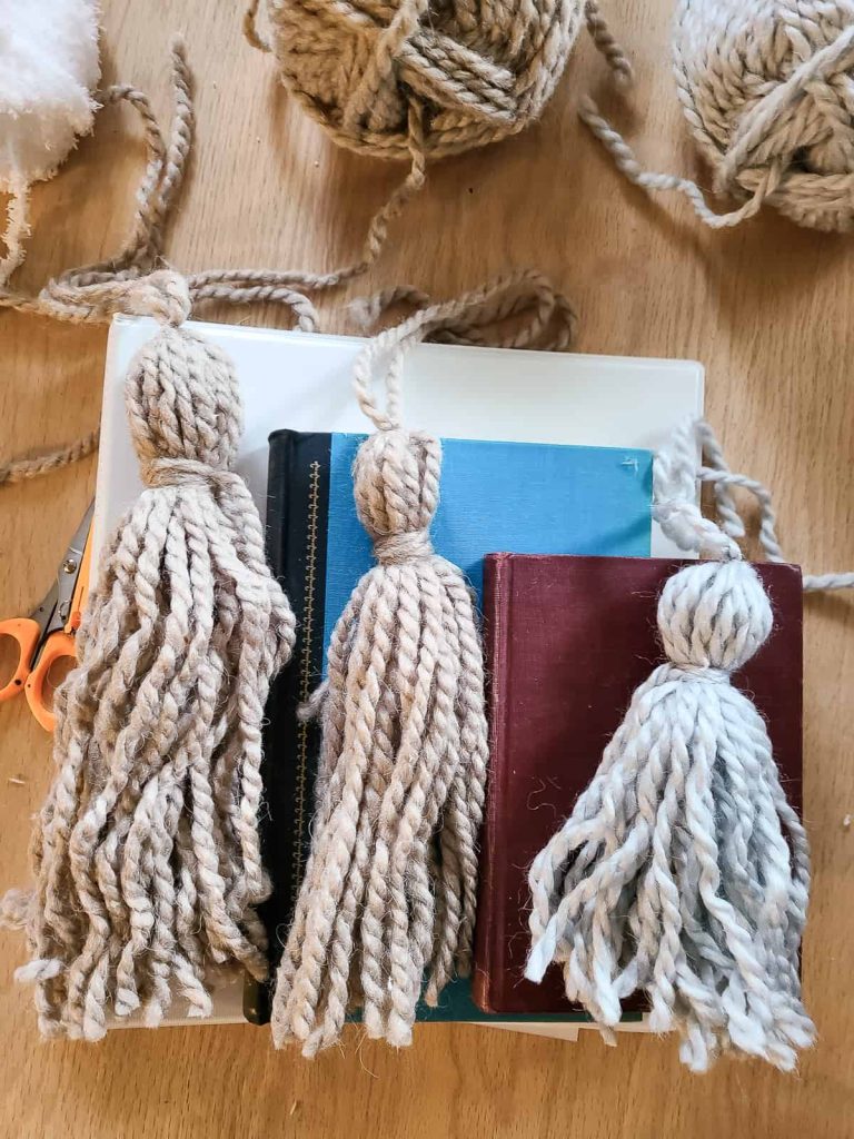 showing different sized yarn tassels 