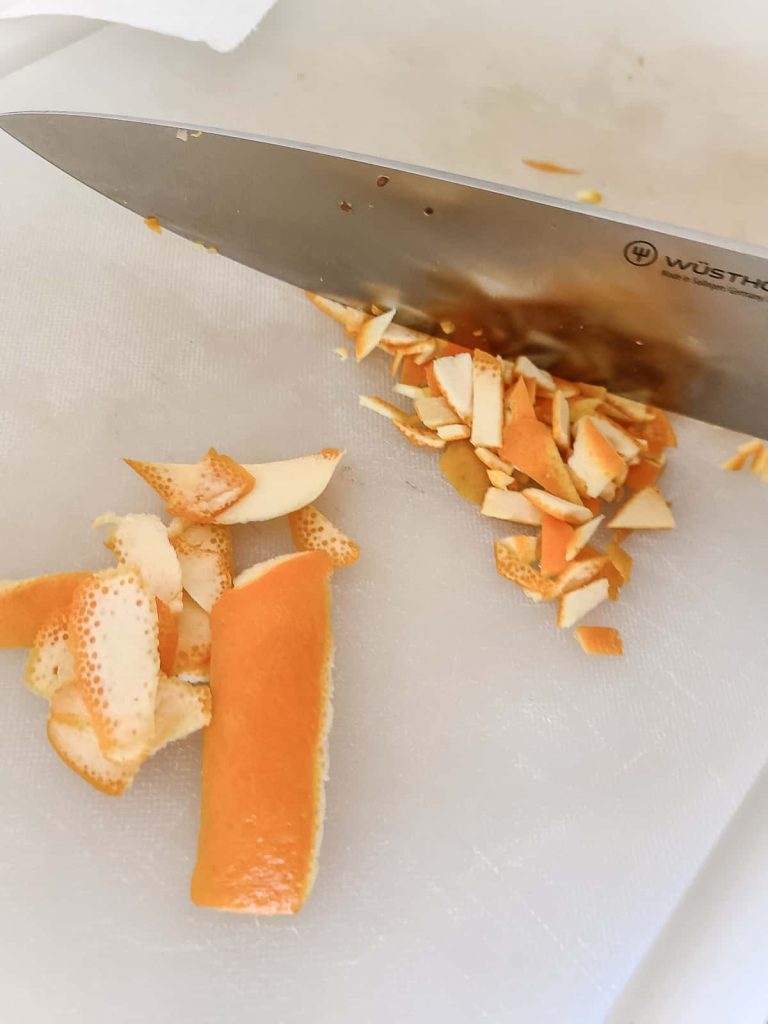 Chop the orange peel before drying for the mulling spices to decrease the dry time and make it easier to put into ornaments