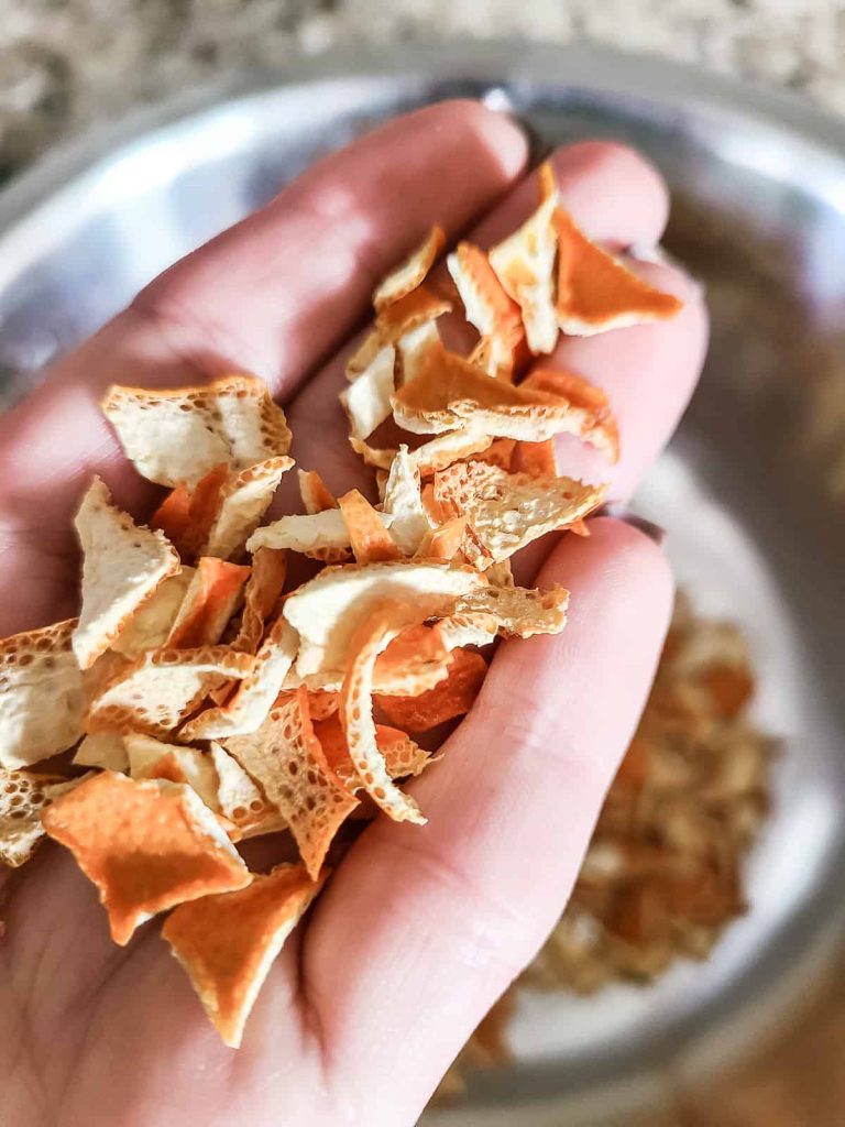 Drying your own chopped orange peel is a great way to save some money when making your own mulling spices gift