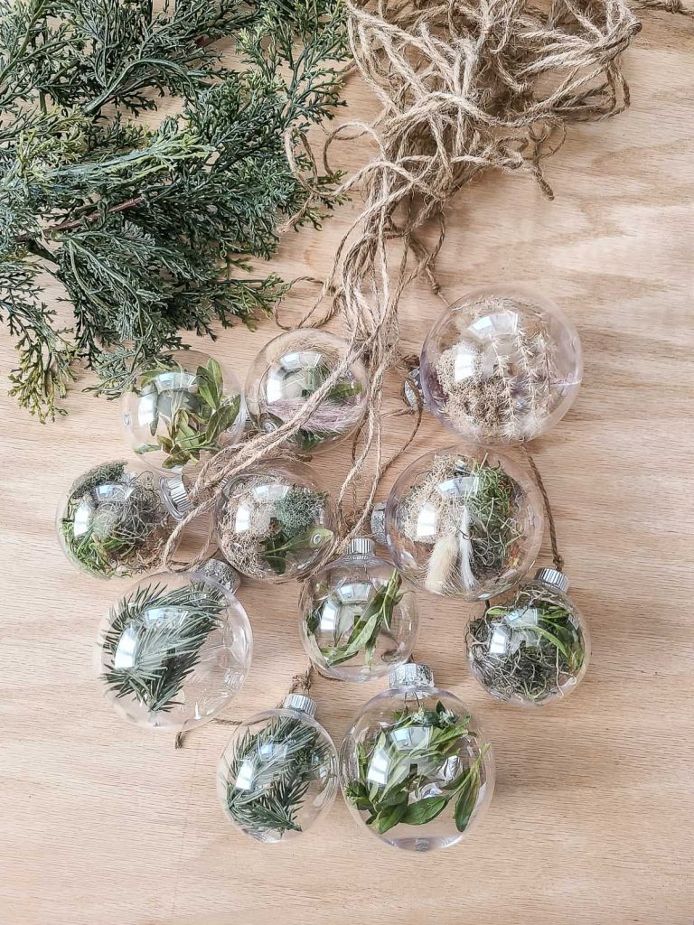 A detailed close-up of a Christmas tree adorned with natural leaves Christmas ornaments, showcasing organic textures and earthy elegance for a unique and nature-inspired holiday display.