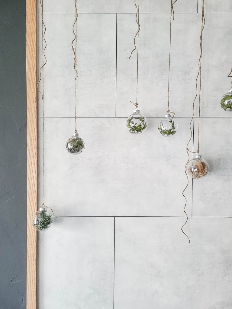 DIY natural christmas ornaments hanging from ceiling by jute twine