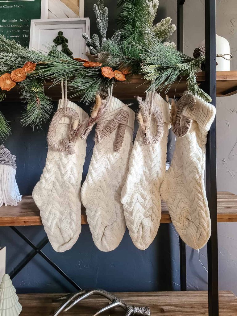 Label your Christmas stockings with yarn wrapped cardboard initials for a quick and budget friendly idea!