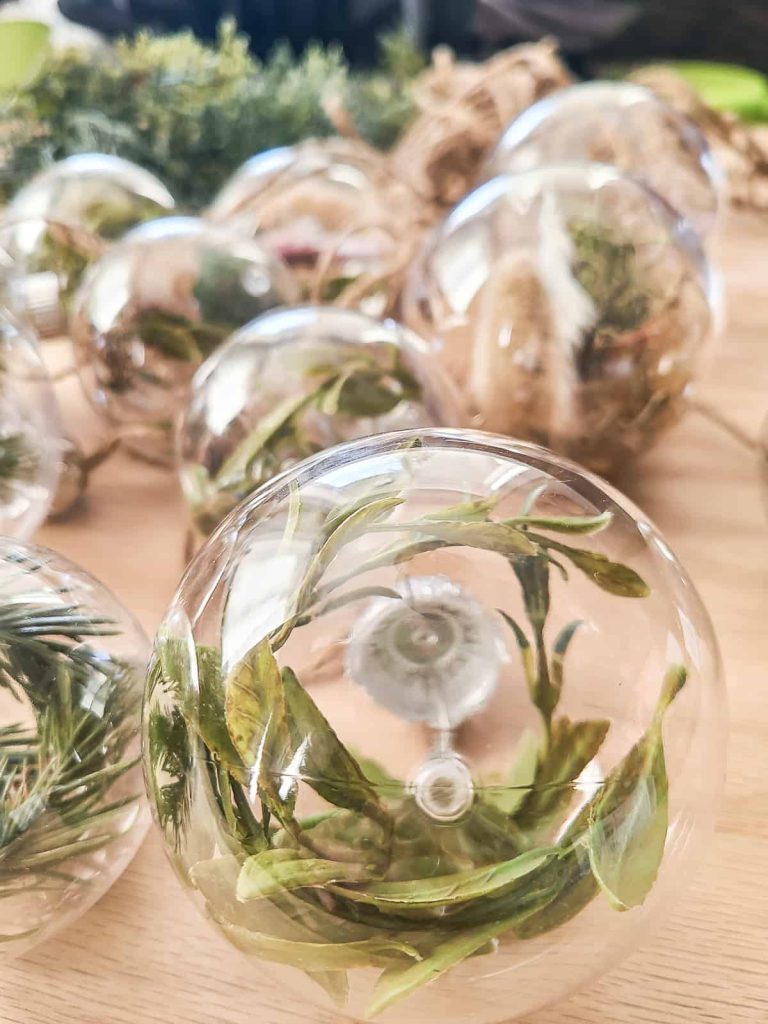 ornament with greenery inside
