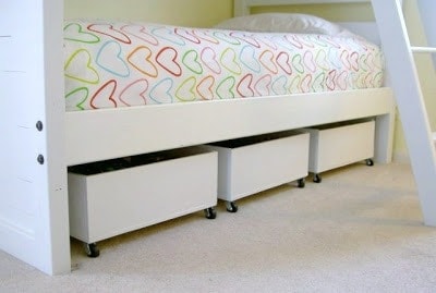 three rolling bins under the bed