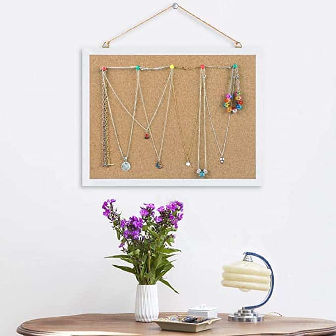 You can store several items on cork boards on the walls of your bedroom, like these necklaces