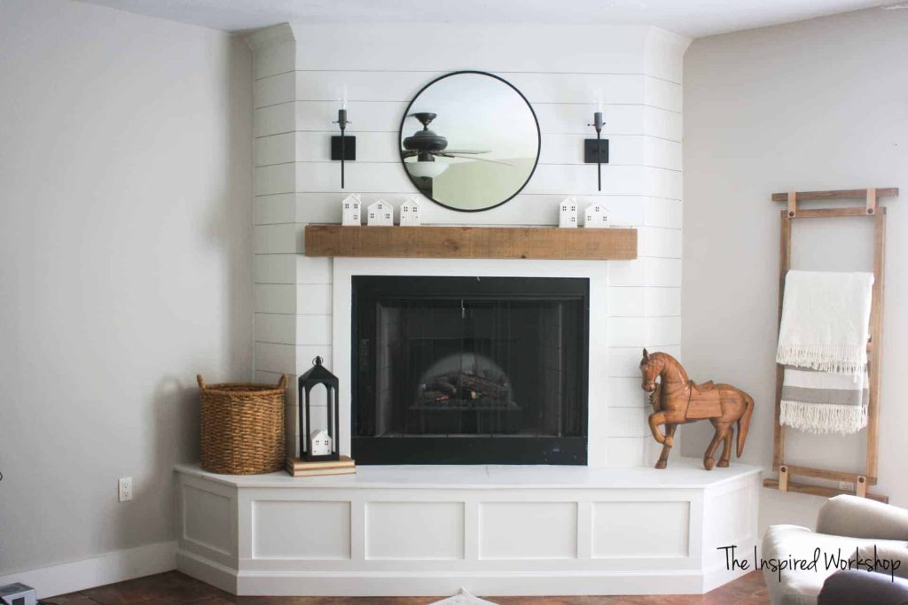 store blankets in the living room using a DIY blanket ladder for vertical blanket storage