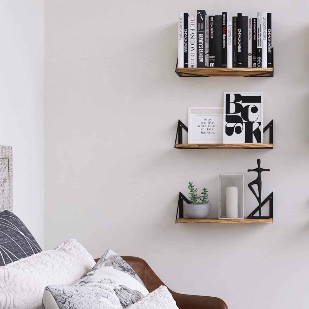 Take advantage of vertical space in your bedroom by installing floating shelves