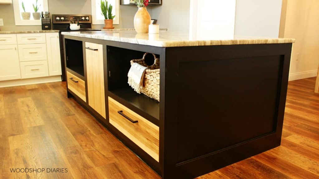 DIY kitchen island painted black with natural wood drawers