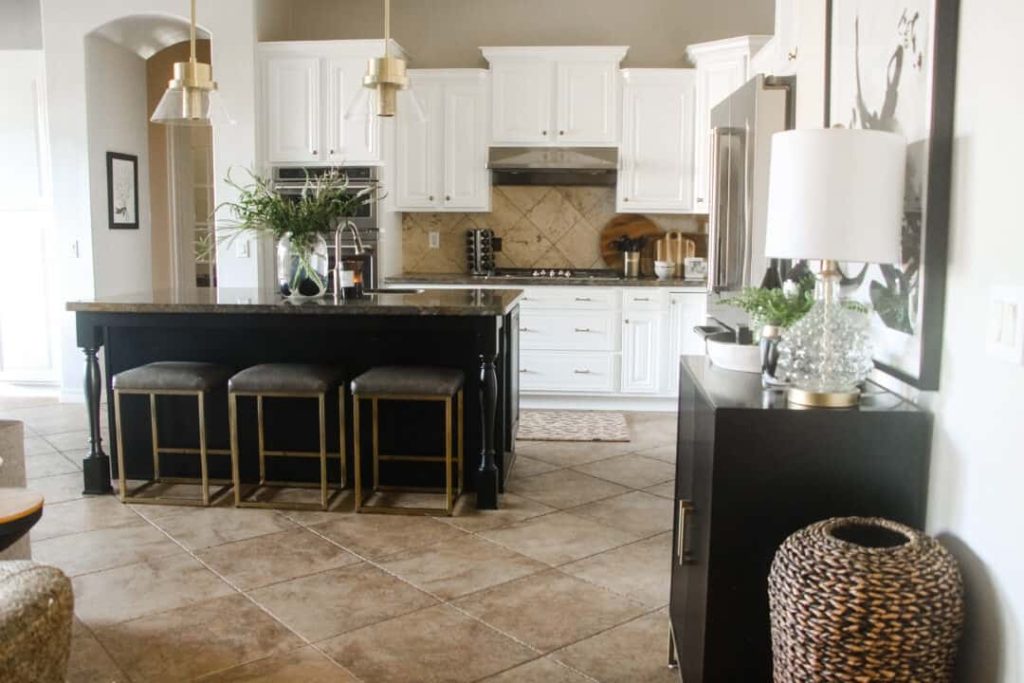 black kitchen island in white kitchen