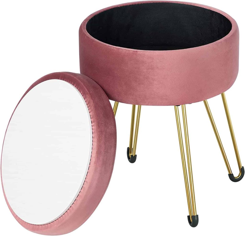 Velvet pink vanity seat that has storage inside