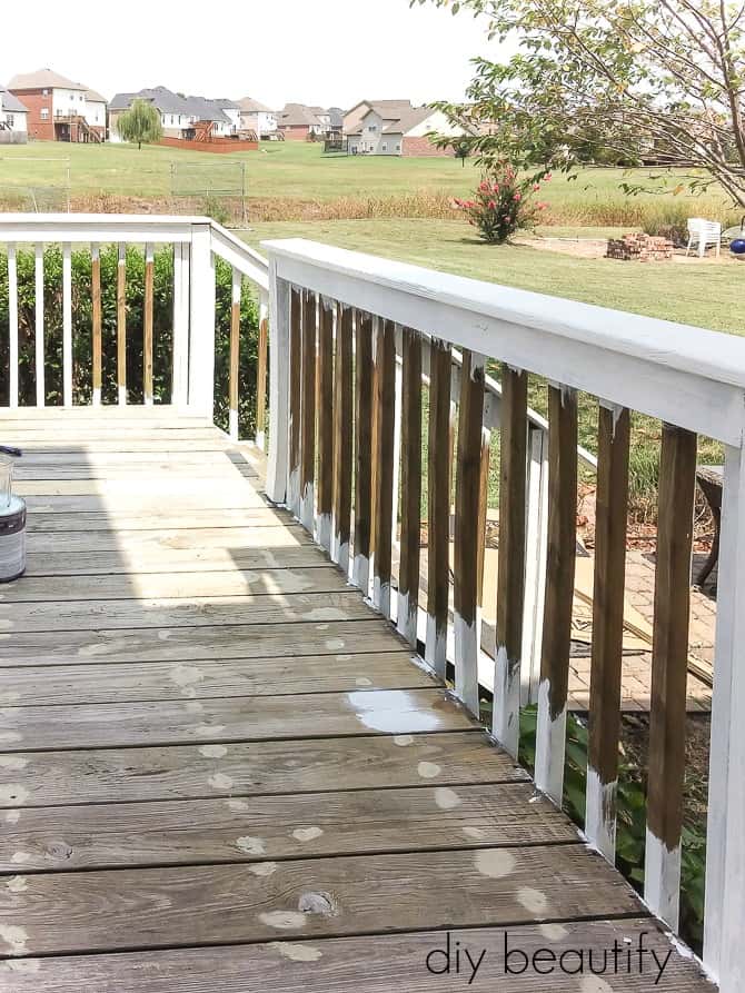 Paint the deck railings gives the backyard deck area a new look and can be done on a budget 