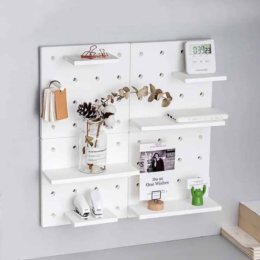A pegboard is a great way to organize things in your bedroom and utilize vertical wall space