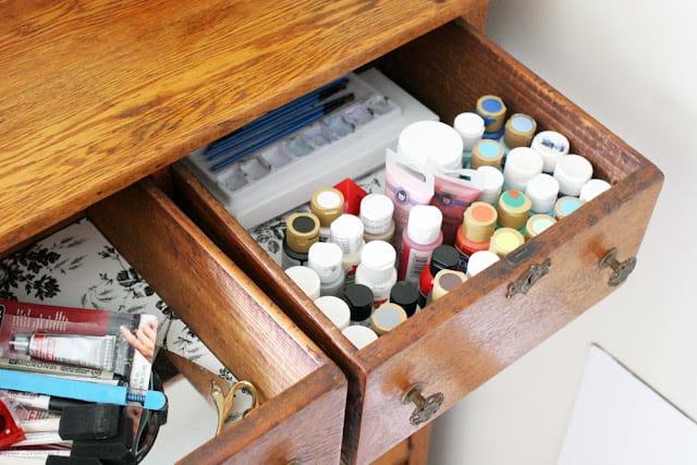 Creative Craft Paint Storage using vintage sewing machine drawers
