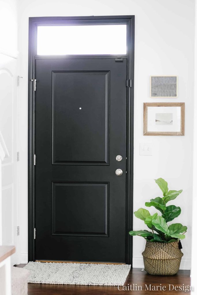 Black painted interior doors are all the rage, love this one painted with Behr's Limousine Leather