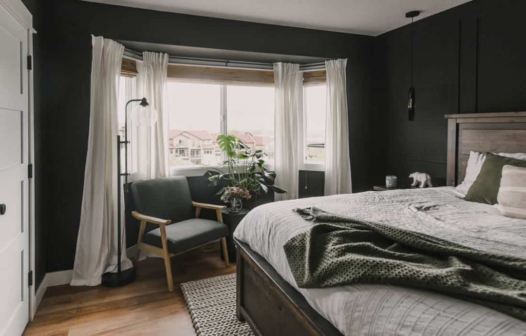 Behr Broadway brings a cozy vibe to this bedroom as it is painted on all four walls