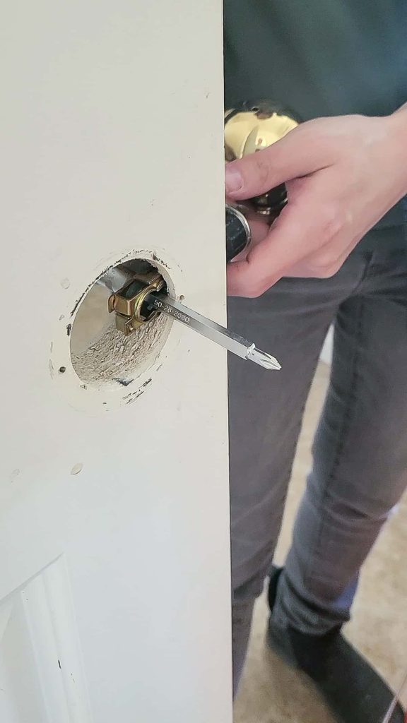 Remove door hardware (hinges and door handles) when painting interior doors