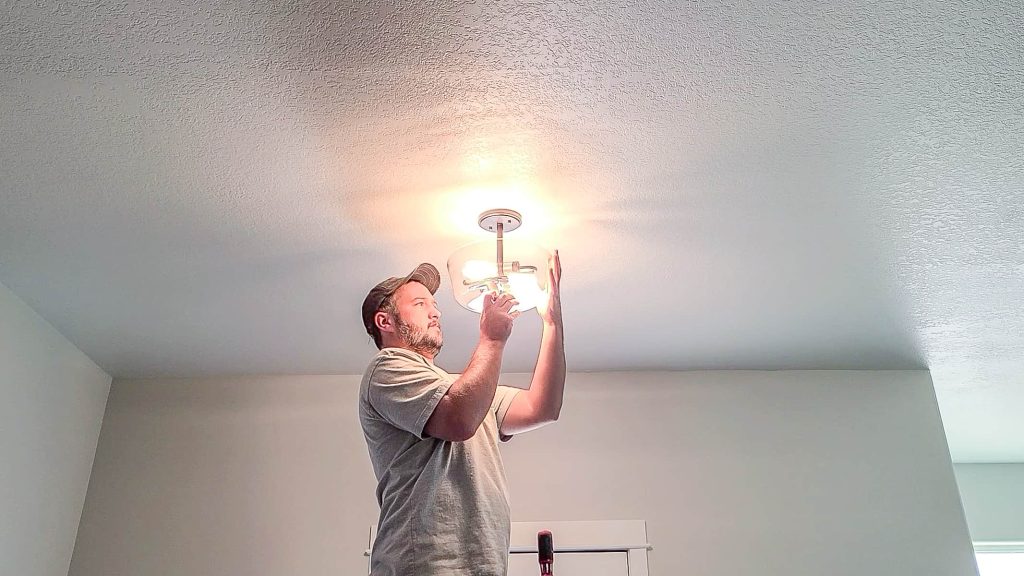 learning how to replace a ceiling light is easy with this tutorial and can be done fast and looks amazing
