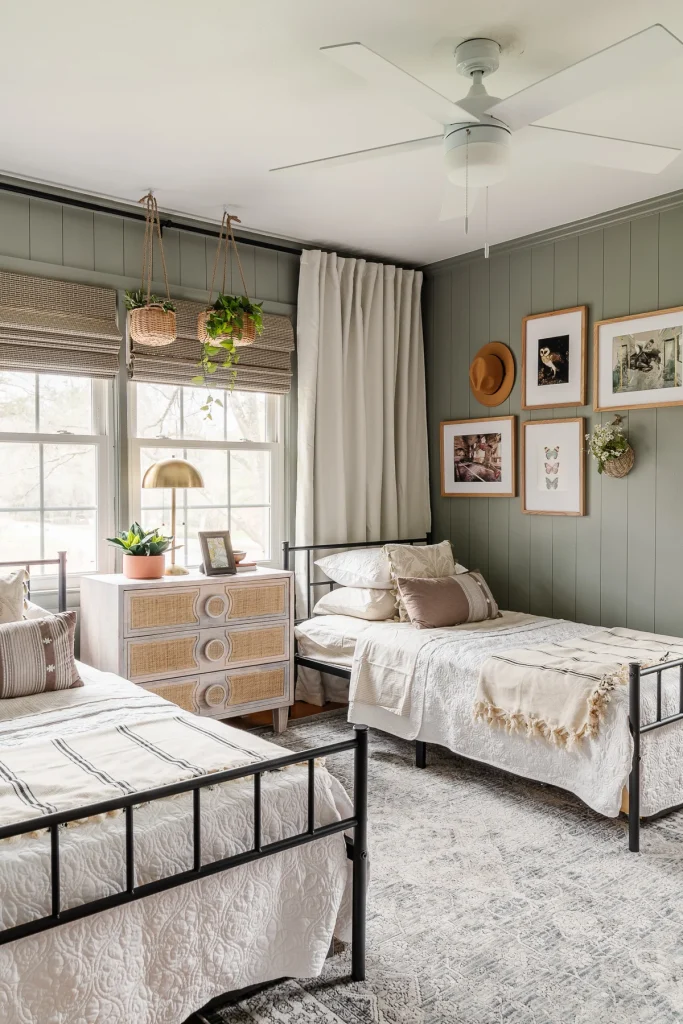 An example of a bedroom decorated in a modern bohemian interior design with wood walls and other nature fibers