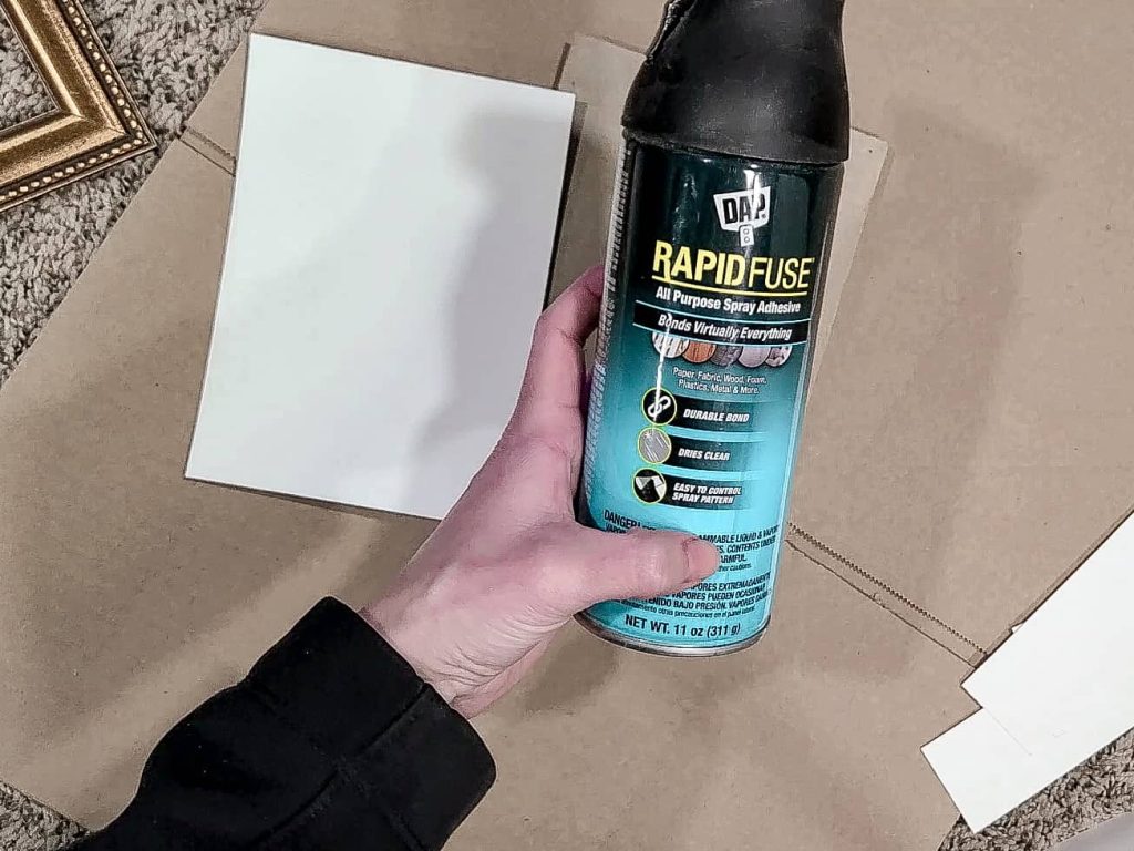 Attach the print to the cardboard backer from your picture frame and get rid of the glass to make room for the print