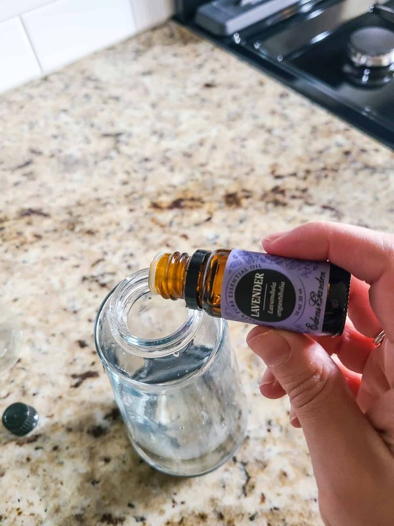 Adding Lavender to a homemade cleaner for cabinets for a how to clean kitchen cabinets tutorial