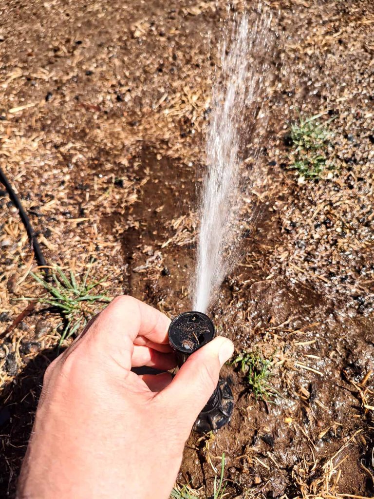 Reposition the arc on a sprinkler head to provide accurate coverage for the entire sprinkler system