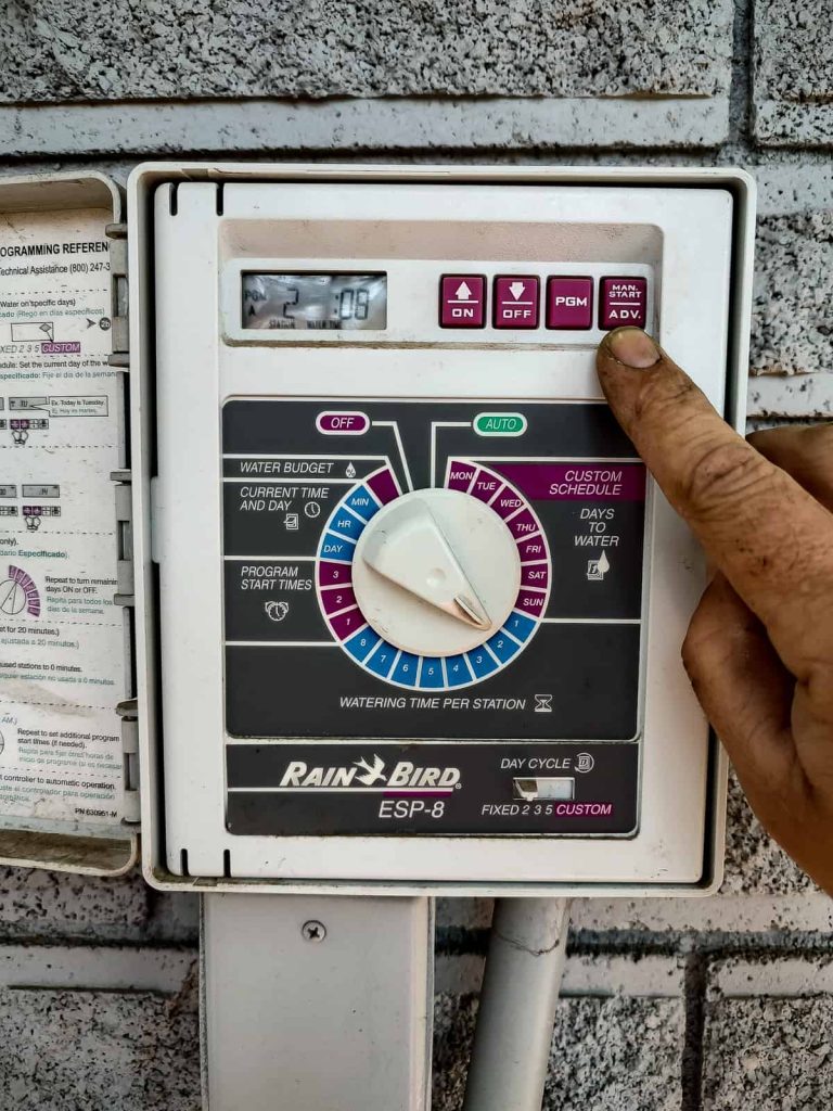 Selecting a sprinkler zone and running the zone manually to fill the zone with water